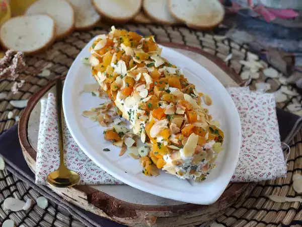 Рецепт Салями из сливочного сыра с абрикосами и миндалем: идеальная закуска для вечеринки!